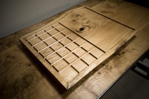 Large carving board made from English Oak with drainage grooves to capture all these tasty meat juices
