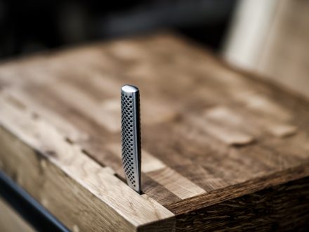 Close-up details of knife holder in this English Oak and steel butchers block